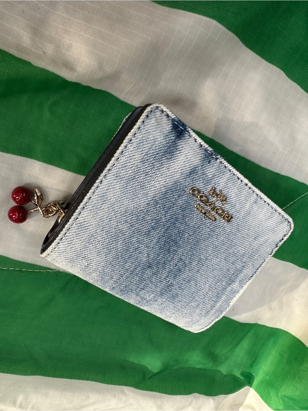 COACH loved denim snap wallet with cherry charm